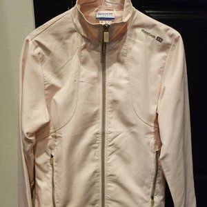 Reebok lined golf jacket. Water resistant. Light Pink. Size M